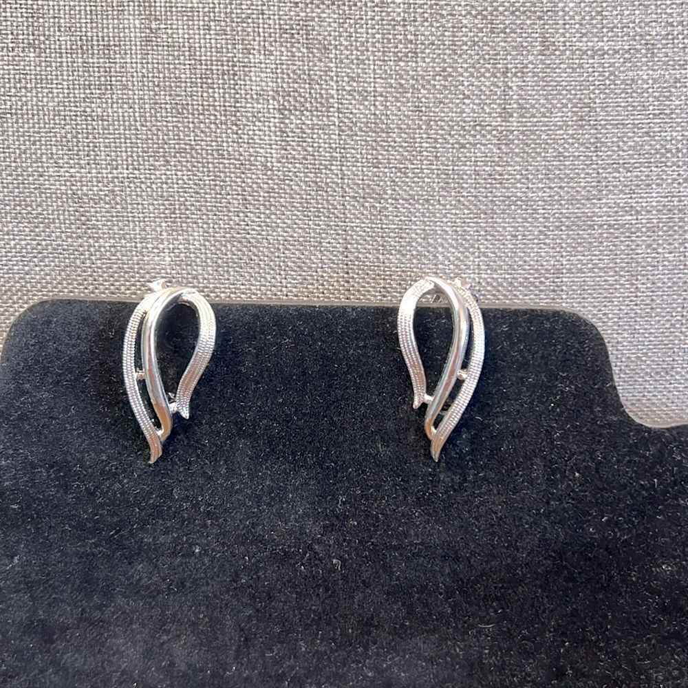 Lovely Sarah Coventry Openwork Swirl Design Clip-On Earrings